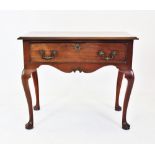A late George III mahogany side table or lowboy,