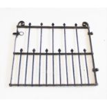 An early 20th century cast iron garden gate,