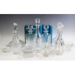 A ships decanter, together with two square decanters and four further decanters,