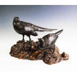 A large Japanese bronze model of two pheasants by The Maruki Company,