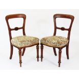 A set of six Victorian walnut dining chairs