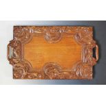 An Arts & Crafts oak serving tray,