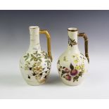 Two Royal Worcester blush ivory Aesthetic ewers,