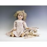 A Schoenau & Hoffmeister bisque head doll, early 20th century,