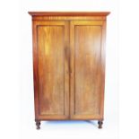 A Victorian mahogany two door wardrobe,