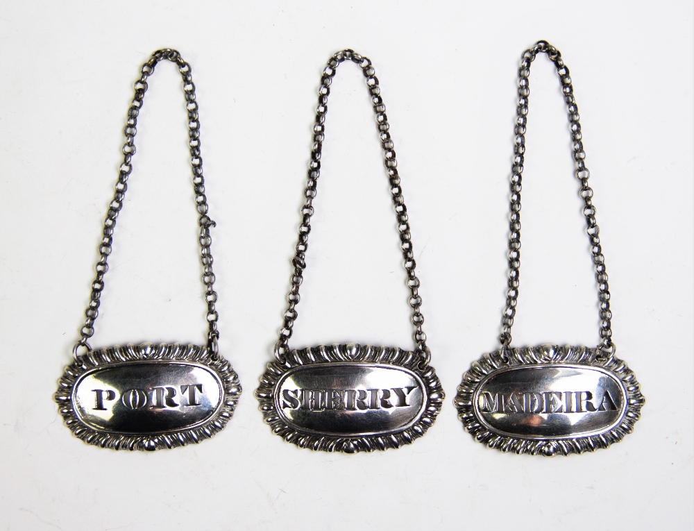 Three 19th century white metal decanter labels, - Image 2 of 2