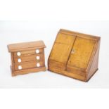 A Victorian pitch pine apprentice chest of three graduated drawers,