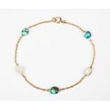 A late 19th early 20th century fresh water pearl and turquoise bracelet