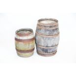 Two antique iron banded oak barrels,