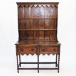 A 19th century dresser base and plate rack,