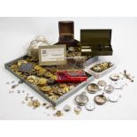 A quantity of pocket watch movements, crystals, springs, balance wheels, dust covers, enamel faces