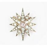 A Victorian diamond set star brooch/pendant, originally from a tiara,