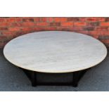 A contemporary circular table of large proportions,