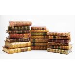 A collection of leather bound books,