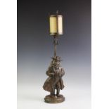 A novelty brass figural table lamp,