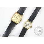 A lady's Omega wristwatch, the circular cream dial with gold toned baton markers, gold plated