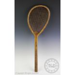 A tilt head lawn tennis racket circa 1875/1880, bearing the initials 'W. Dod', this early tilt