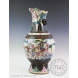 A large Chinese porcelain famille rose vase, 19th century, of baluster form, with craquelure body,