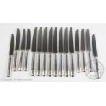 A set of eight silver handled dinner knives, 'B D', Sheffield 2001, each 25cm long, with a further