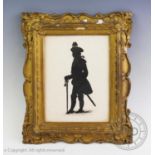 English School, 19th century, Silhouette on paper, full length portrait of a military gentleman,