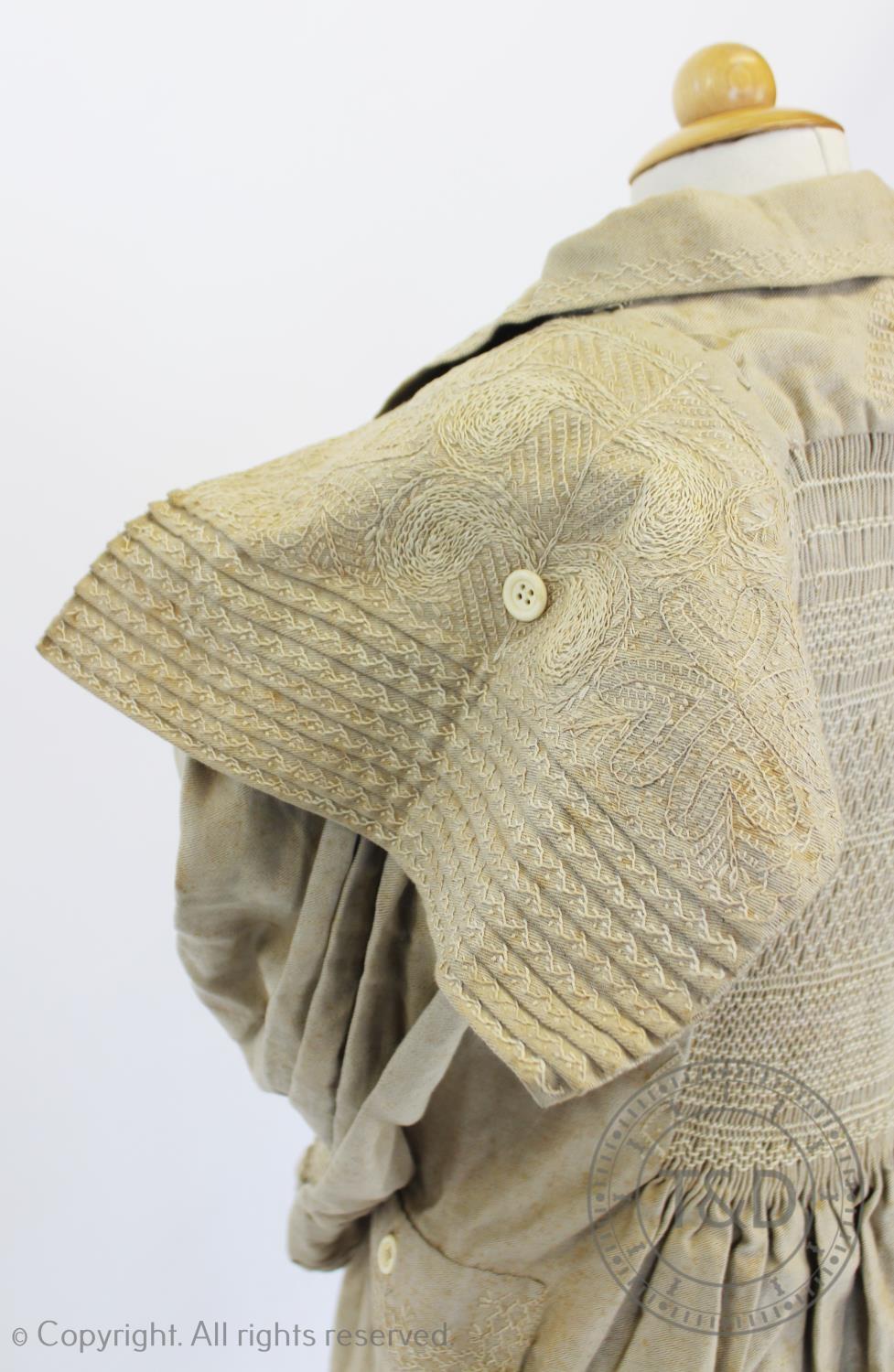 An early 19th century natural heavy twill cotton smock, with smocked detail to the front, back and - Image 4 of 4