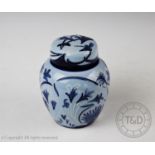 A Moorcroft ginger jar and cover decorated in the ?Midnight Summer? design by Philip Gibson 2002 (