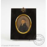 English School, 19th century, Watercolour portrait miniature of a gentleman wearing a black frock