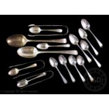 A selection of silver flatware to include a pair of George III silver Old English pattern