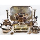 A selection of silver plated wares to include, a pair of Corinthian column candlesticks, on