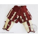 A pair of 17th century style silk taffeta breeches, in russet and cream colours with bows and