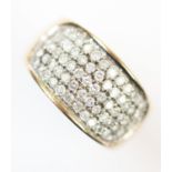 A gent's diamond set 9ct gold ring, the central panel pave set with five rows of small brilliant cut