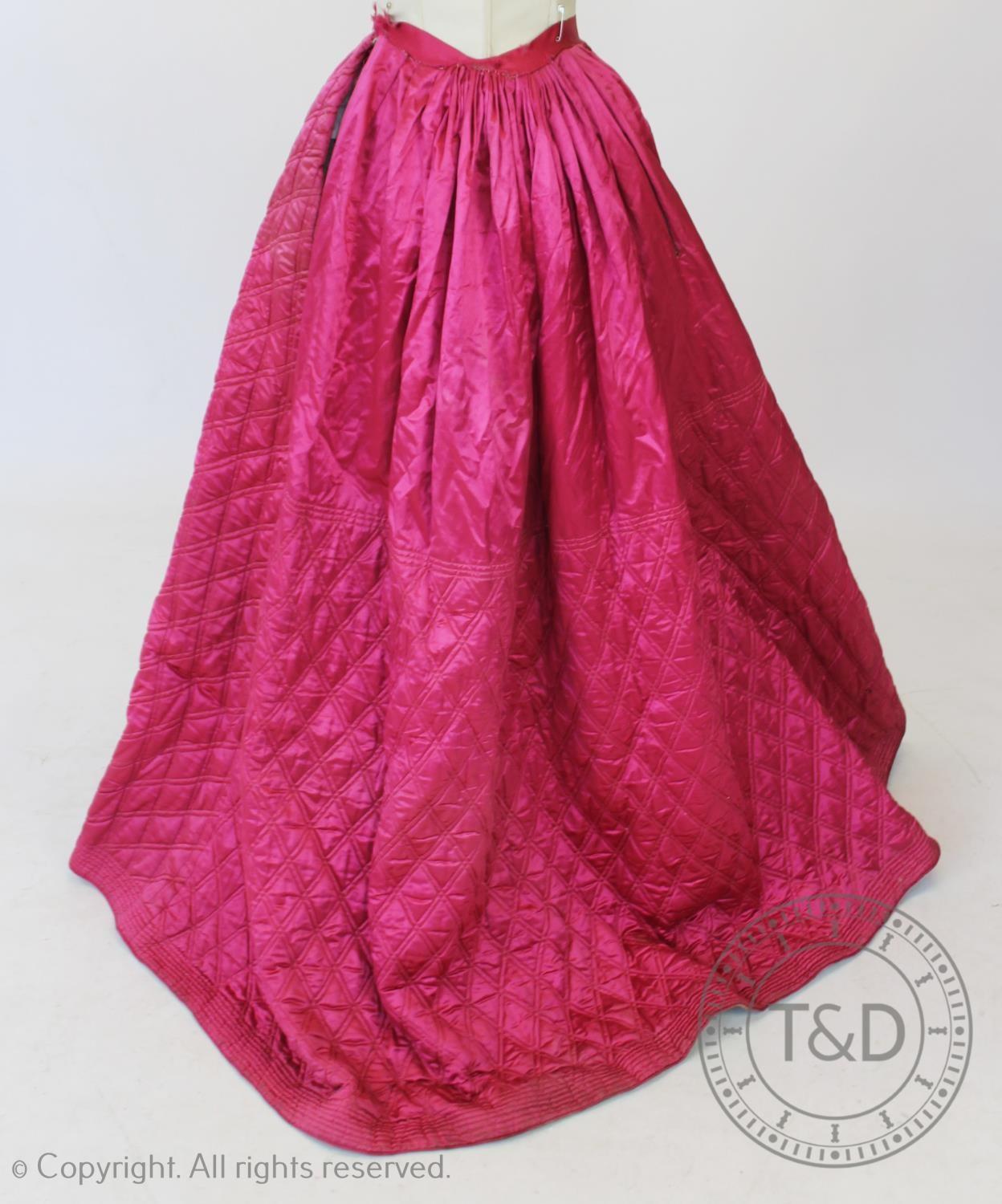 A fuscia silk quilted petticoat, circa 1845, with diamond quilted detail to the front and back and - Image 3 of 4