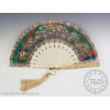 A Chinese ivory and paper painted fan within black laquer fan case 19th century, the guards worked