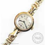 A lady's vintage 9ct gold Rolex cocktail watch, the circular dial with Arabic numerals and