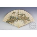 A late 19th century Japanese ivory fan, the guards both inlaid with Shibayama depicting wysteria and