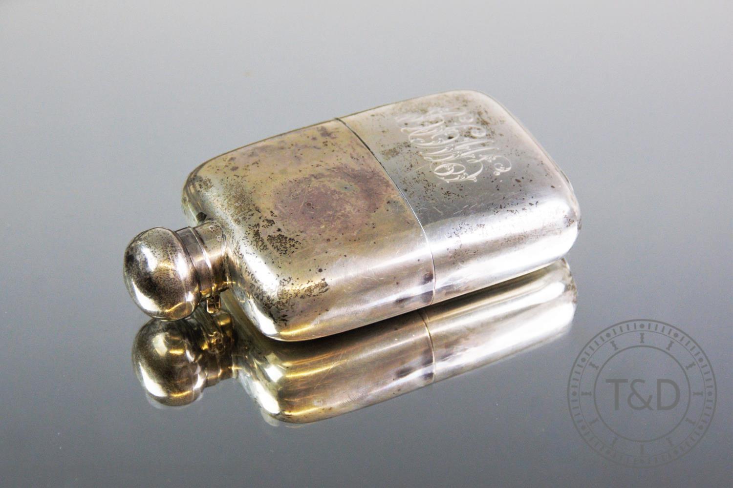 A George V silver hip flask, W & G Neal, London 1911, the rectangular body with detachable silver