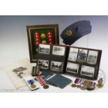 A collection of World War II and military items to include a medal group, unnamed, comprising: