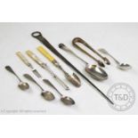 A selection of silver and silver coloured flatware, comprising: a George III silver meat skewer,