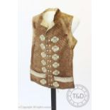 A brown metallic embroidered waistcoat, circa 1800, extensively decorated with metallic crimson