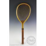 A lawn tennis racket by F.H. Ayres of London circa 1880, with original intact strings