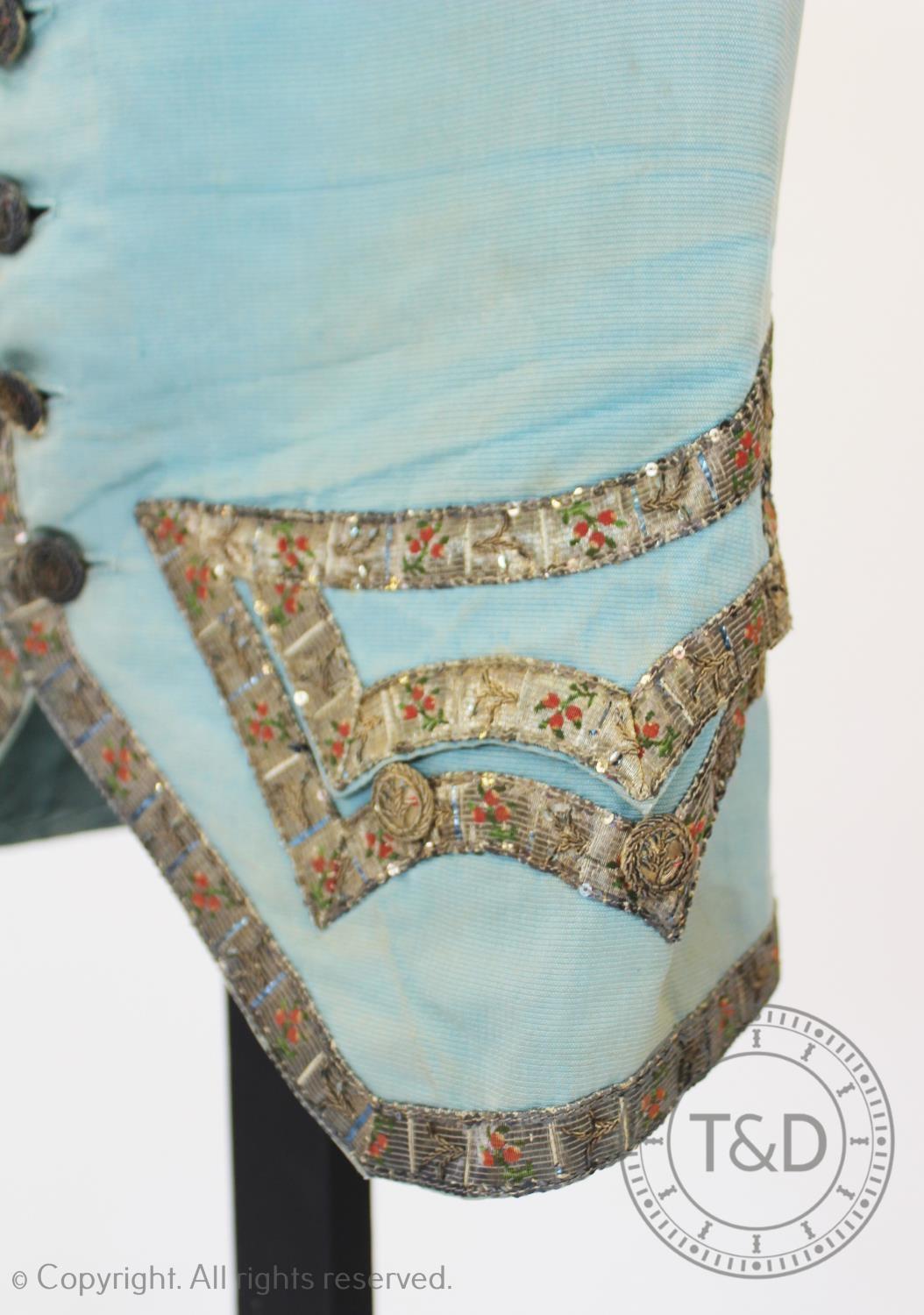 A cornflower blue, ribbed silk gentlemans waistcoat, circa 1785, with silvered braid to the - Image 2 of 4