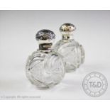 A pair of Victorian silver mounted cut glass scent bottles, John Grinsell & Sons, Birmingham 1900,