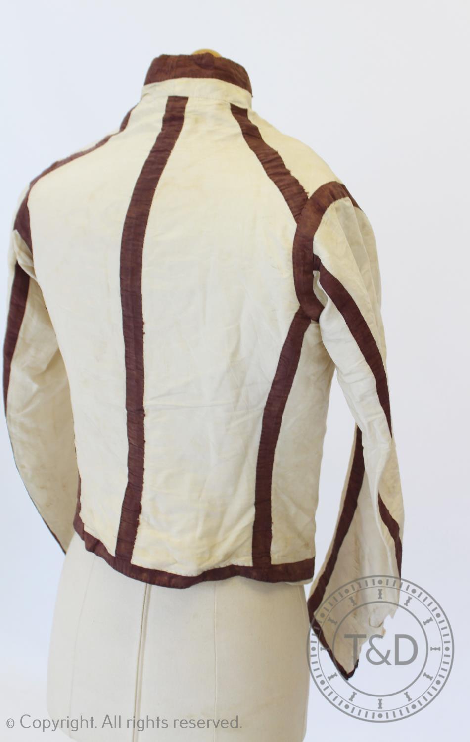 An ivory silk taffeta sleeved waistcoat or jacket, circa 1810, boldly banded and edged in dark plum, - Image 4 of 5