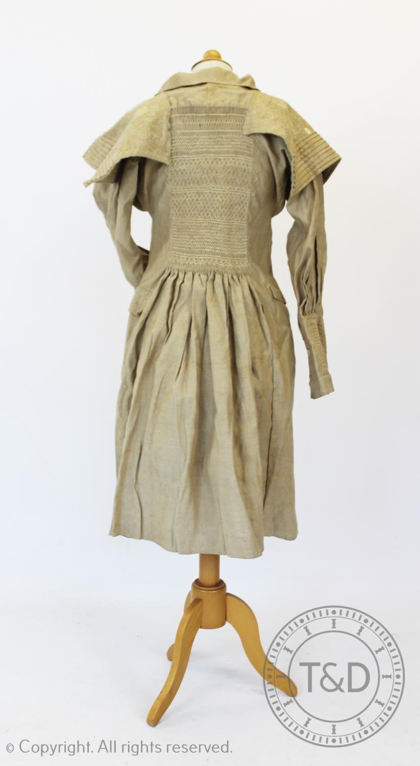 An early 19th century natural heavy twill cotton smock, with smocked detail to the front, back and - Image 3 of 4