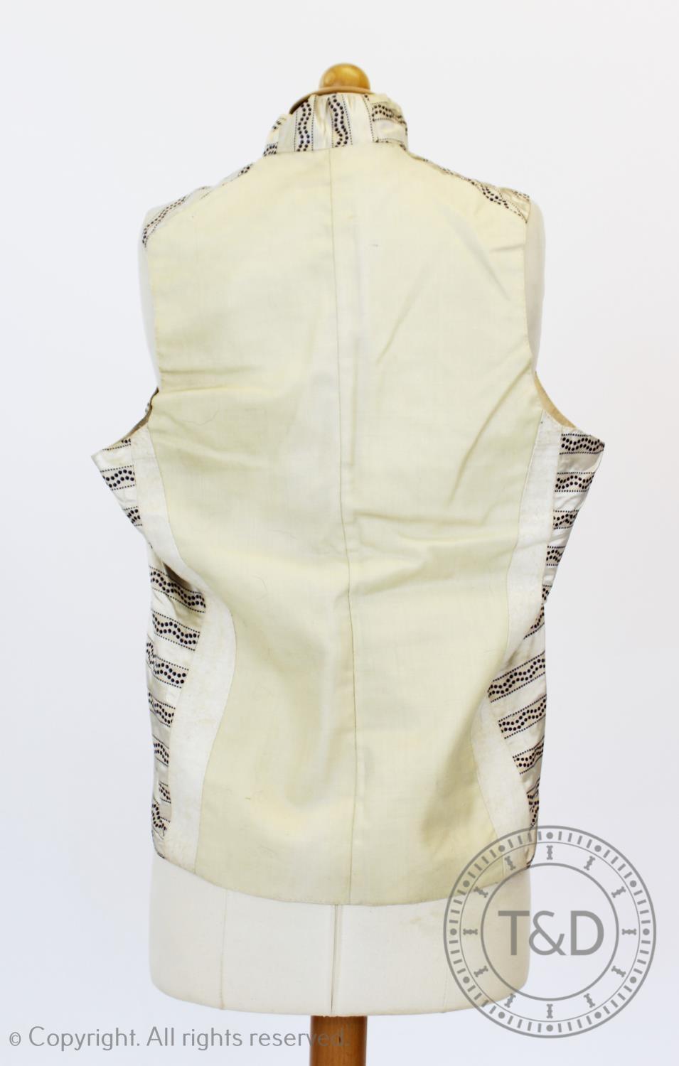 An ivory and mint green figured silk waistcoat, circa 1820, edged with figured silk braid and - Image 3 of 8