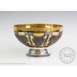 The Queen's Golden Jubilee 2002 commemorative silver plated bowl, decorated with a swag design of