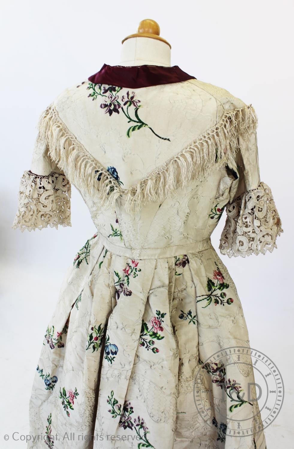 A Spitalfield silk dress, circa 1760's, the ivory silk with woven rococo design with sprays of - Image 5 of 6