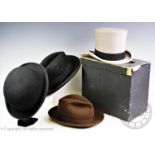 A vintage hat collection, comprising: a Harrod's bowler hat, a Herbert Johnson (Bond Street) Ltd