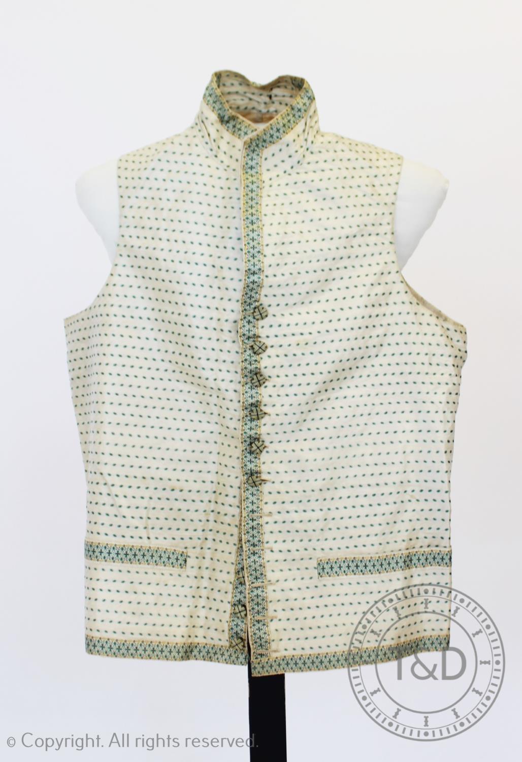 An ivory and mint green figured silk waistcoat, circa 1820, edged with figured silk braid and - Image 4 of 8