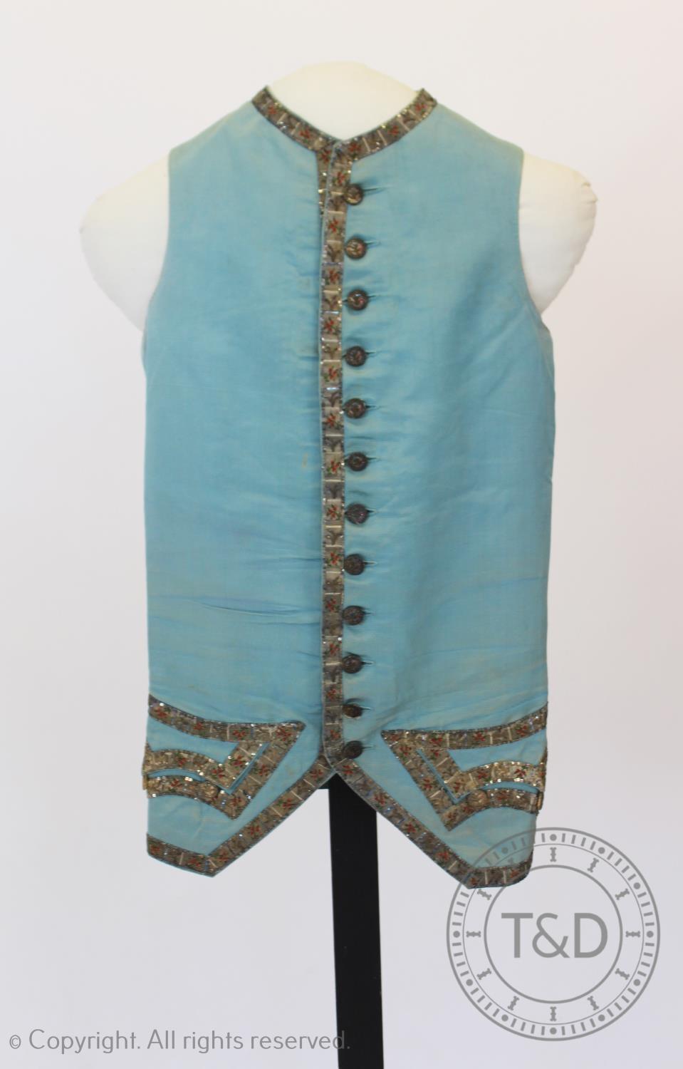 A cornflower blue, ribbed silk gentlemans waistcoat, circa 1785, with silvered braid to the